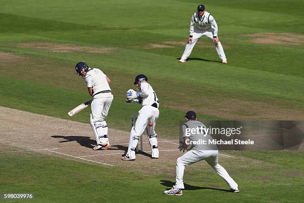 Dawid Malan of Middlesex is caught at first slip by Rikki Clarke of Warwickshire off the bowling of Josh Poysden during day one of the Specsavers...