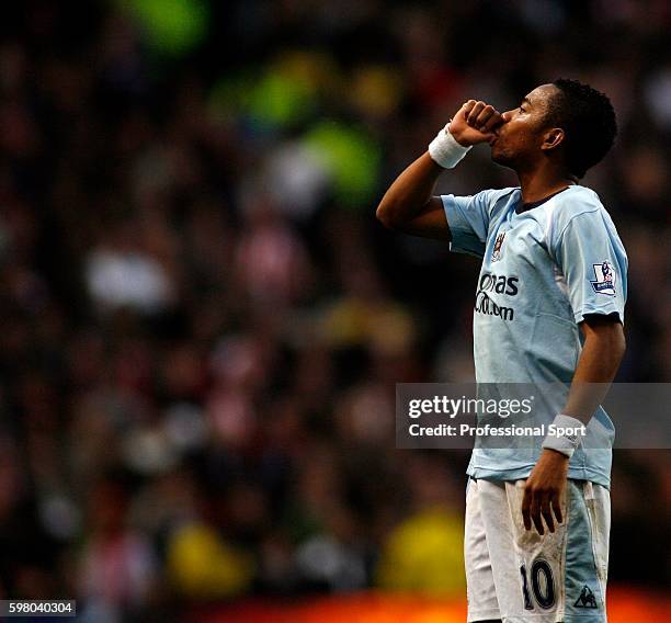 Robinho of Manchester City celebrates after scoring his third goal during the Barclays Premier League match between Manchester City and Stoke City at...