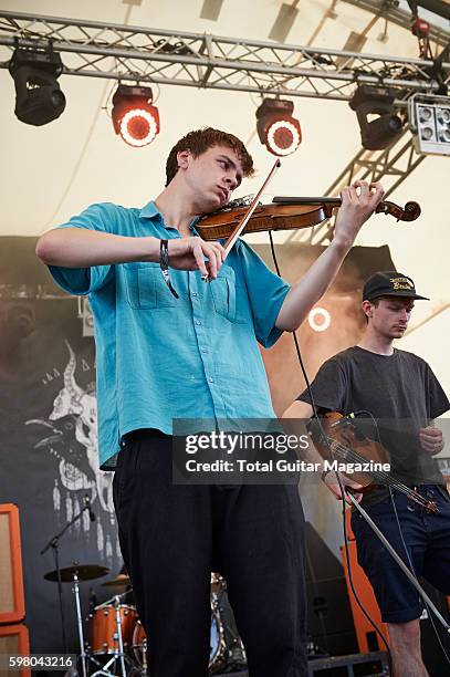 Violinists Reuben Brunt and Sam Little of English post-rock group Talons performing live on stage at ArcTanGent Festival in Somerset, on August 22,...