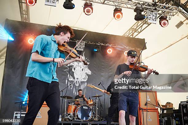 Violinists Reuben Brunt and Sam Little of English post-rock group Talons performing live on stage at ArcTanGent Festival in Somerset, on August 22,...