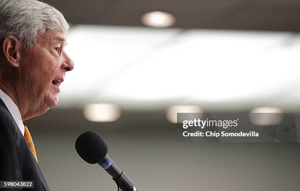 Former U.S. Senator Bob Graham talks to reporters about a recently released section of the 2002 House Intelligence Committee inquiry into the attacks...