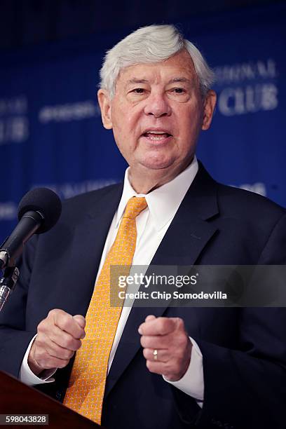 Former U.S. Senator Bob Graham talks to reporters about a recently released section of the 2002 House Intelligence Committee inquiry into the attacks...