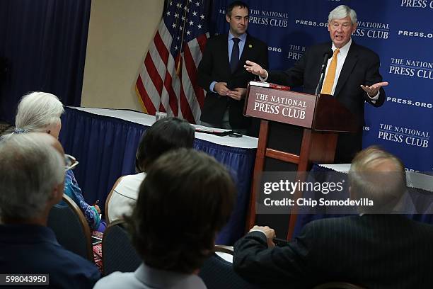 Former U.S. Senator Bob Graham talks to reporters about a recently released section of the 2002 House Intelligence Committee inquiry into the attacks...