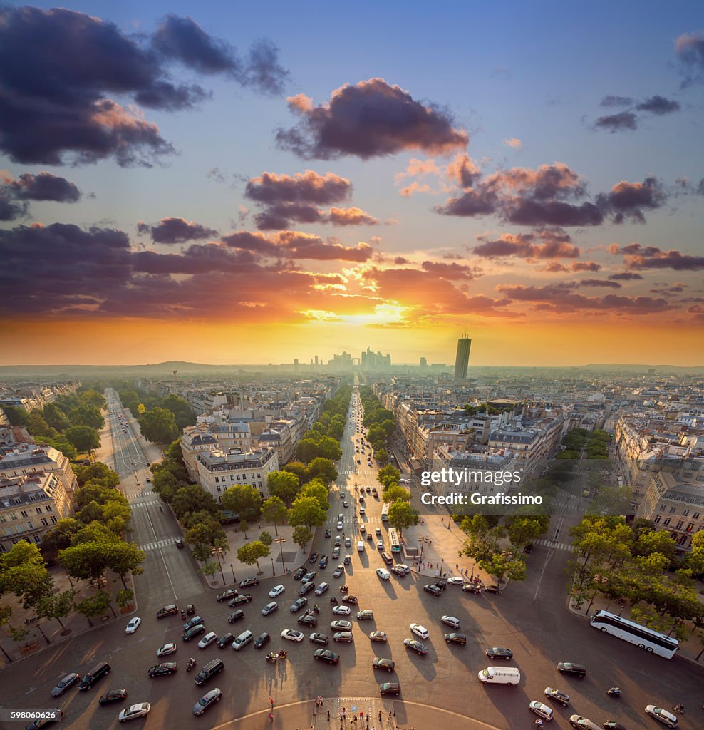 France Paris Champs Elysees with traffic at sunset