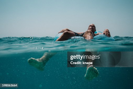 Man floating in the Mediterranean Sea in Croatia