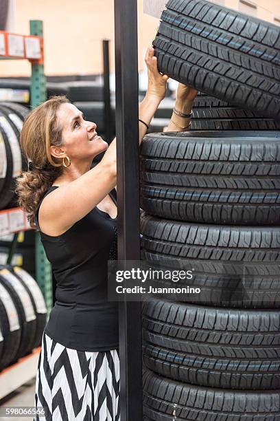 shopping for tires - tyre shop stock pictures, royalty-free photos & images