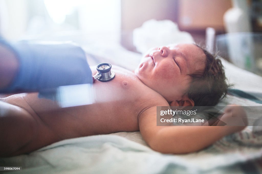Newborn Baby Having Heart Checked