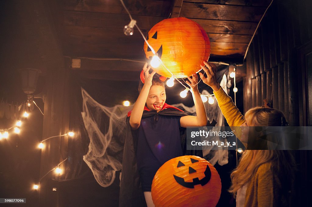 Mom and daughter decorate for Halloween