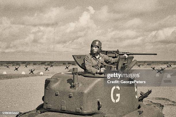 world war 2 armored tank on beach - tweede wereldoorlog stockfoto's en -beelden