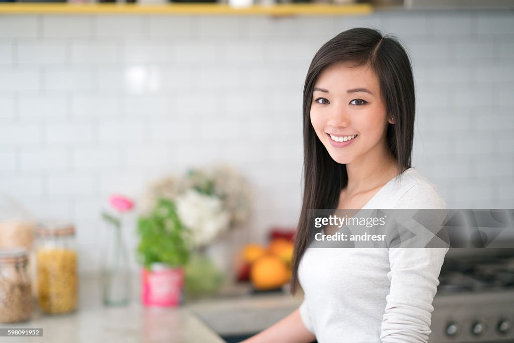 Asian woman at home