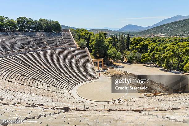 ancient theater of epidaurus in greece - epidaurus greece stock pictures, royalty-free photos & images