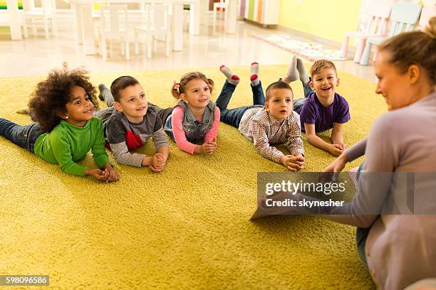 Kids On Rug Rugime Kindergarten Carpet Photos and Premium High Res Pictures - Getty Images