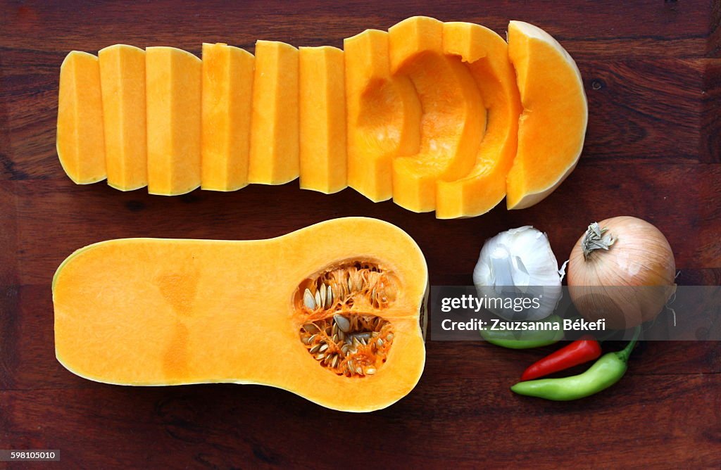 Butternut squash soup ingredients on a cutting board