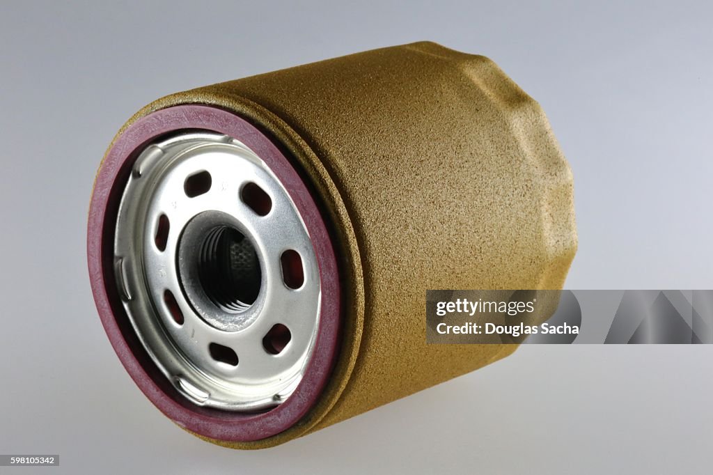 Spin-on canister oil filter showing seal and screw-on thread