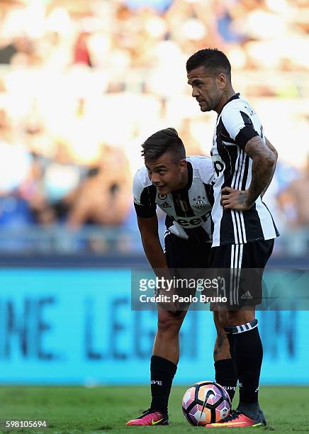 Paulo Bruno Exequiel Dybala and Dani Alves Da Silva of Juventus FC looks onduring the Serie A match between SS Lazio and Juventus FC at Stadio...