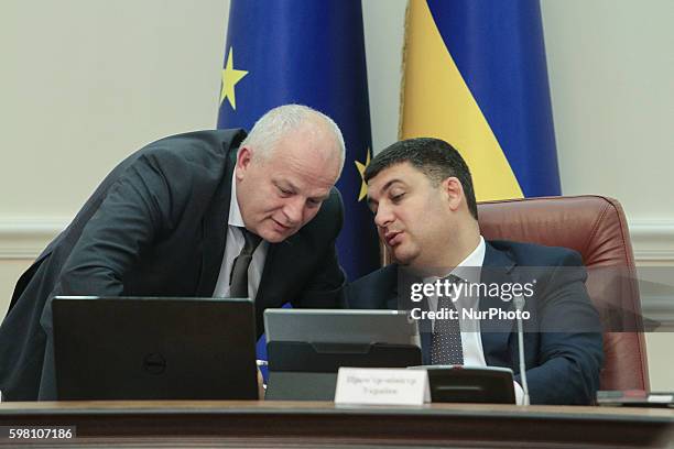 Prime minister VOLODYMYR GROYSMAN talks to First Vice Prime Minister - Minister of Economic Development and Trade of Ukraine STEPAN KUBIV during the...