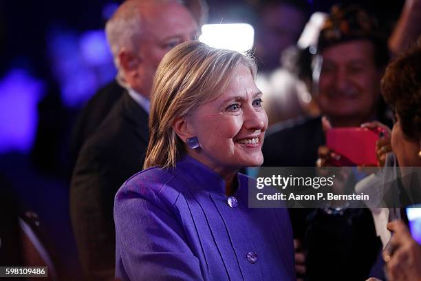 Democratic presidential nominee Hillary Clinton greets attendees at the American Legion Convention August 31, 2016 in Cincinnati, Ohio. Clinton spoke...