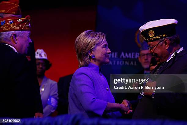 Democratic presidential nominee Hillary Clinton greets attendees at the American Legion Convention August 31, 2016 in Cincinnati, Ohio. Clinton spoke...