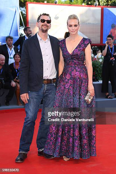 Jury member Nina Hoss and Alex Silva attend the opening ceremony and premiere of 'La La Land' during the 73rd Venice Film Festival at Sala Grande on...