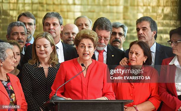 Brazil's Dilma Rousseff speaks at the Alvorada presidential palace in Brasilia after she was stripped of the country's presidency in a Senate...