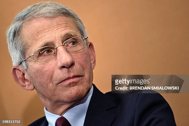 Dr. Anthony Fauci, director of the National Institute of Allergy and Infectious Diseases, listens during a discussion about the Zika virus during an...