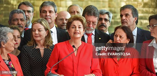 Brazil's Dilma Rousseff speaks at the Alvorada presidential palace in Brasilia after she was stripped of the country's presidency in a Senate...