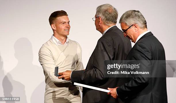 Maximilian Mittelstaedt of Hertha BSC is awarded by with the Fritz-Walter-Medal for his outstanding performance during the last year during the...