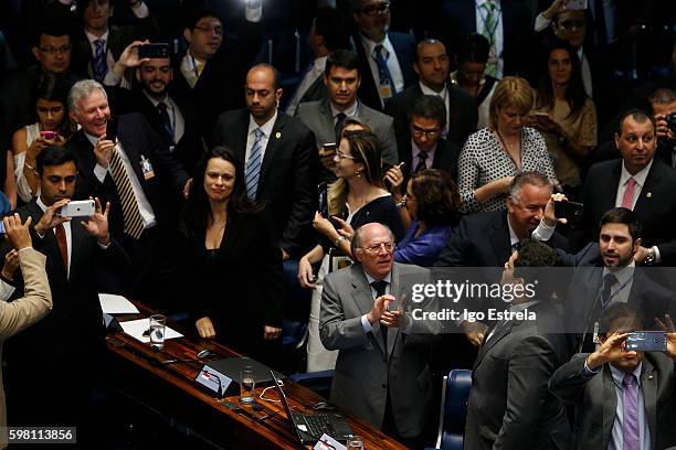 Advocates Miguel Reale and Janaina Paschoal, at right, celebrate at the impeachment proceedings of President Dilma Rousseff August 31, 2016 in...