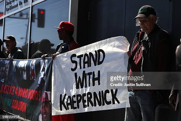 Protestors demonstrate in support of San Francisco 49ers quarterback Colin Kaepernick outside of the San Francisco Police Officers Association...