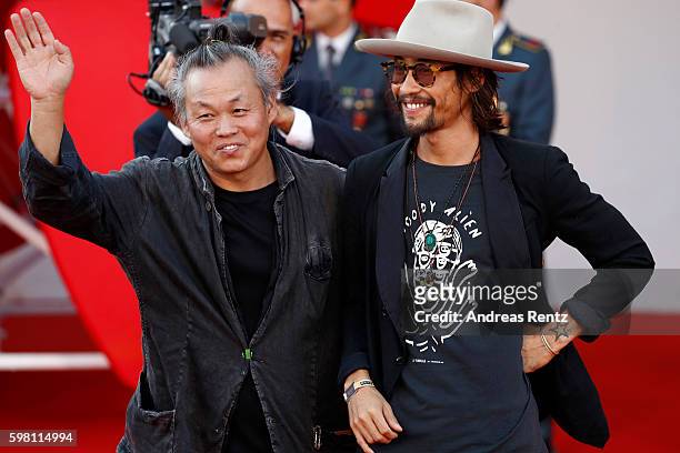 Ryoo Seung-Bum and Kim Ki-duk attend the opening ceremony and premiere of 'La La Land' during the 73rd Venice Film Festival at Sala Grande on August...