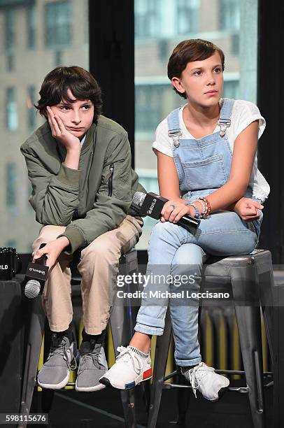 Actors Finn Wolfhard and Millie Bobby Brown of "Stranger Things" attend the BUILD Series at AOL HQ on August 31, 2016 in New York City.