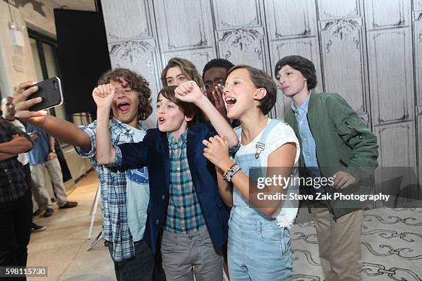 Gaten Matarazzo, Noah Schnapp, Millie Bobby Brown and Finn Wolfhard attend Build series to discuss "Stranger Things" at AOL HQ on August 31, 2016 in...