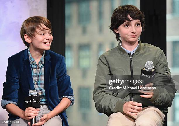 Actors Noah Schnapp and Finn Wolfhard of "Stranger Things" attend the BUILD Series at AOL HQ on August 31, 2016 in New York City.