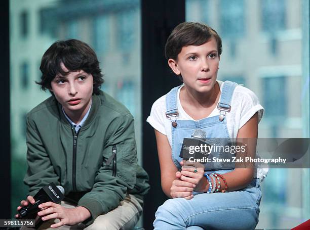 Finn Wolfhard and Millie Bobby Brown attend Build series to discuss "Stranger Things" at AOL HQ on August 31, 2016 in New York City.