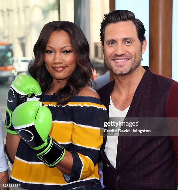 Actress/host Garcelle Beauvais poses with actor Edgar Ramirez at Hollywood Today Live at W Hollywood on August 31, 2016 in Hollywood, California.