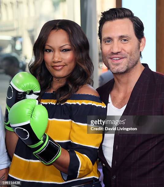 Actress/host Garcelle Beauvais poses with actor Edgar Ramirez at Hollywood Today Live at W Hollywood on August 31, 2016 in Hollywood, California.