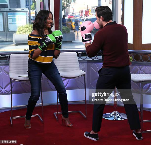 Actress/host Garcelle Beauvais spars with actor Edgar Ramirez at Hollywood Today Live at W Hollywood on August 31, 2016 in Hollywood, California.
