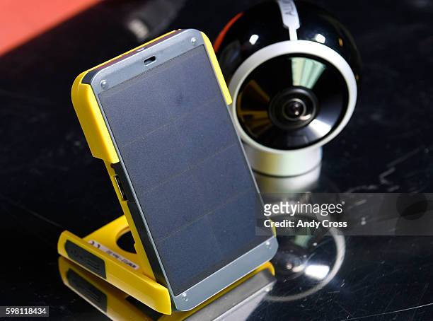 August 31: The WakaWaka solar cell phone charger, left, and the ALLie 360 degree camera at the Denver Post August 31, 2016.