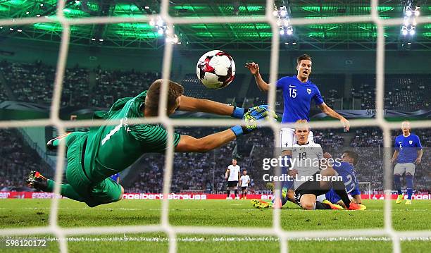 Max Meyer of Germany scores the opening goal past Lukas Hradecky of Finland during the International Friendly match between Germany and Finland at...