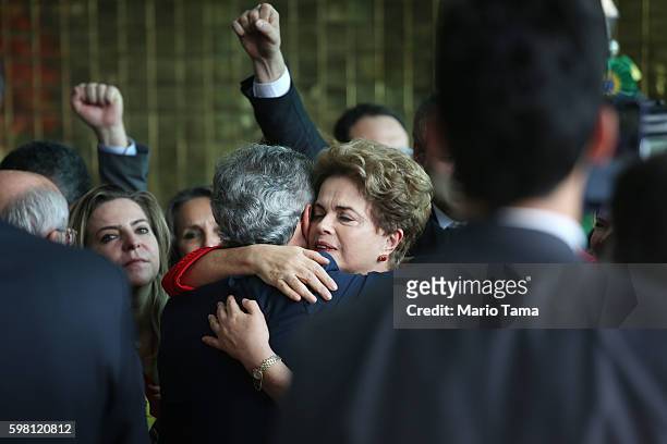 Impeached President Dilma Rousseff hugs a supporter after delivering her farewell address in Alvorado Palace on August 31, 2016 in Brasilia, Brazil....