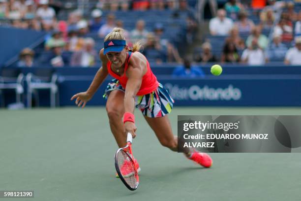 Angelique Kerber of Germany hits a return against Mirjana Lucic-Baroni of Croatia during their 2016 US Open Women's Singles match at the USTA Billie...