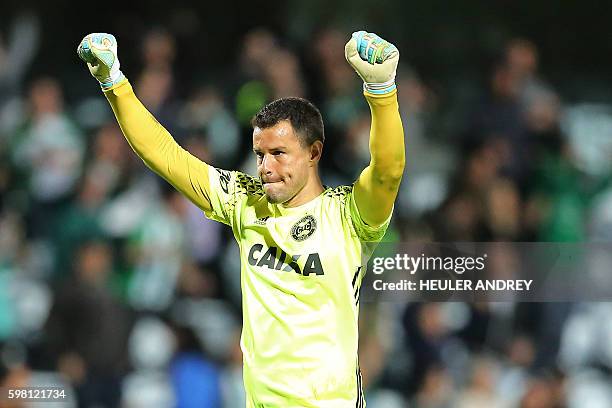 Brazil's Coritiba goalkeeper Wilson Rodrigues celebrates after winning to Brazil's Vitoria during a Sudamericana Cup football match at the Couto...