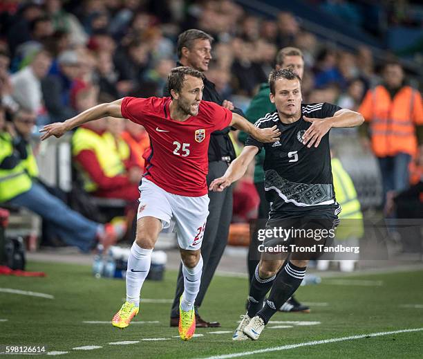 Magnus Wolff Eikrem of Norway, Dzianis Kisliak of Belarus during the match between Norway and Belarus at Ullevaal Stadion on August 31, 2016 in Oslo,...