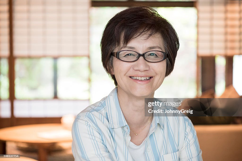 Portrait of happy mature Japanese woman