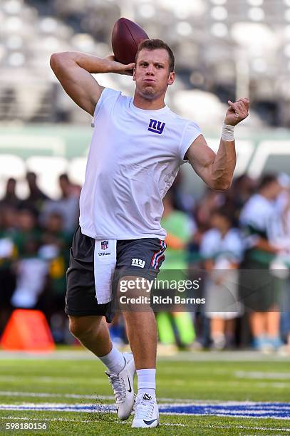 Ryan Nassib of the New York Giants warms up prior to a preseason game against the New York Jets at MetLife Stadium on August 27, 2016 in East...