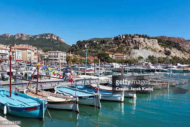 row of traditional boats - cassis stock-fotos und bilder
