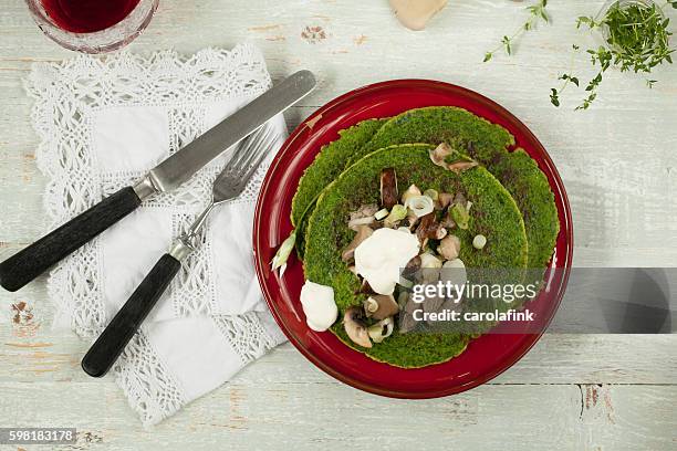 wild garlic pancakes - carolafink stock pictures, royalty-free photos & images