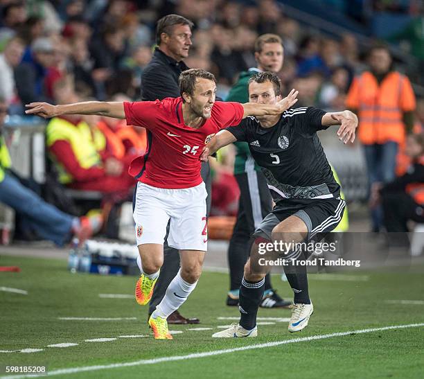 Magnus Wolf Eikrem of Norway, Dzianis Paliakou of Belarus during the match between Norway and Belarus at Ullevaal Stadion on August 31, 2016 in Oslo,...