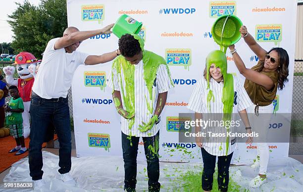 Derek Jeter and Sharlee Jeter at Nickelodeon's and Derek Jeter's Turn 2 Foundation's "Road to Worldwide Day of Play" event at Kalamazoo County Expo...