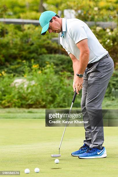 Rory McIlroy of Northern Ireland putts on the practice green prior to the Deutsche Bank Championship at TPC Boston on August 31, 2016 in Norton,...